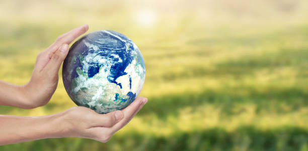 istock Globe ,earth in human hand, holding our planet glowing. Earth image provided by Nasa 2176262908