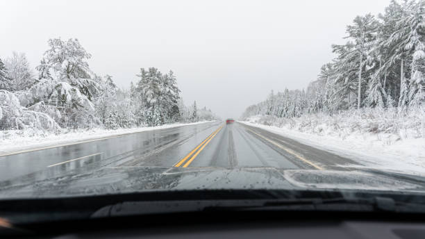 istock Driving on icy highway after a snowstorm 2176265110