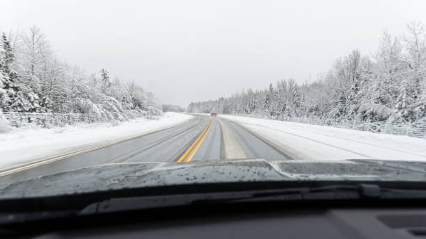 istock Driving on icy highway after a snowstorm 2176265111