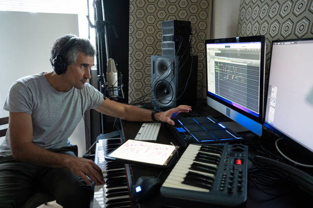 istock Musician Recording Piano Theme in Home Music Studio 2176268209