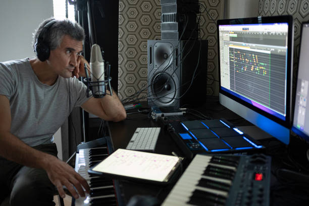 istock Musician Recording Piano Theme in Home Music Studio 2176268469