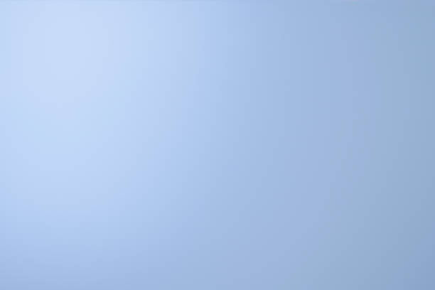 istock Delicate light blue wall. with a soft spot with a color gradient on the left. Light blue background 2176268955