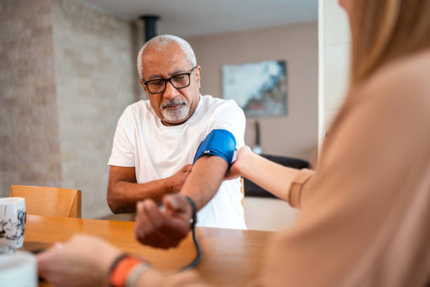 istock Senior Black Male Checking Blood Pressure at Home 2176269622