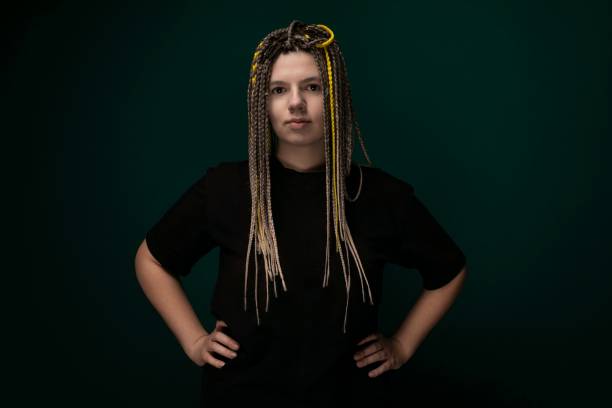 istock Woman With Long Blonde Dreadlocks Standing With Hands on Hips 2176269640