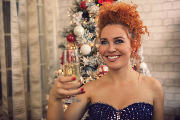 istock Beautiful young woman celebrating new year 2176271248