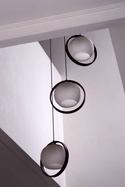 istock round white hanging lamp with wooden ring accents 2176277838
