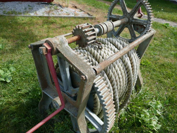 istock Antique nautical ship manual winch with rope and gears 2176279043