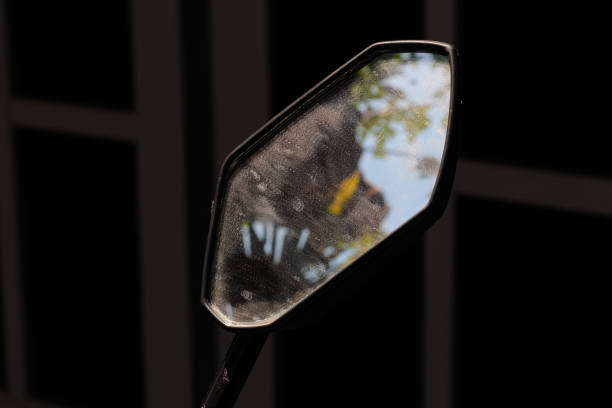 istock motorcycle rearview mirror on dark background 2176279234