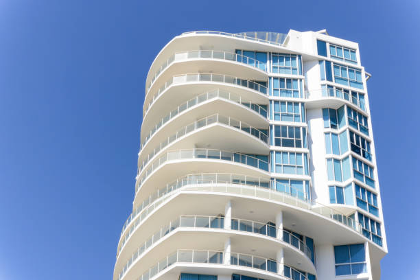 istock Modern apartment building against blue sky, background with copy space 2176281297
