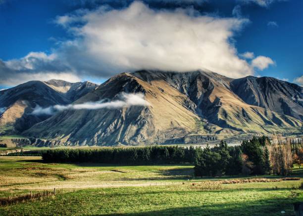 A tranquil rural scene of clouds over the mountain beside Lake Lyndon