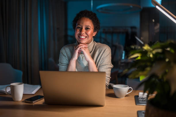 istock Mixed Race Female Professional Working Late at Office Desk 2176286204