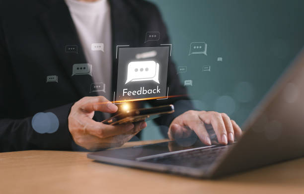 istock Feedback service concept. Employee comment rating online. Businessman use computer give feedback review icon, reputation management on speech bubble. Hotel customer satisfaction survey experience on app 2176311241
