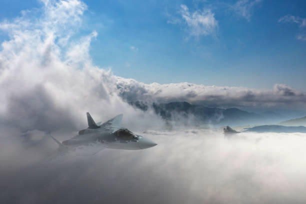 istock SU-57 Jet fighters flying over clouds. 2176311586