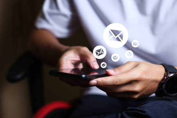 istock Email marketing concept. Hand using smartphone , tablet, for email virtual screen. Business digital technology and marketing. 2176321576