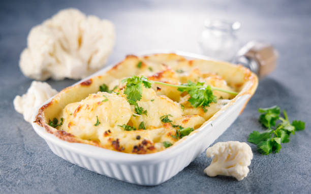 istock baked cauliflower with cream and cheese 2176323486