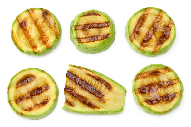 istock grilled sliced zucchini isolated on white background. clipping path 2176330648