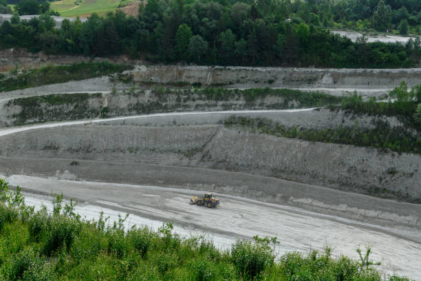 istock Beautiful industrial landscape with visible active chalk mine, opencast mining, extraction of natural resources 2176335178
