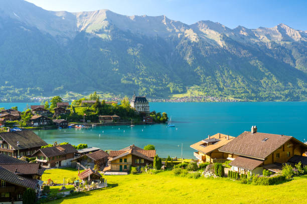 istock view on Iseltwald on Brienzersee lake with Alps in Switzerland 2176336742