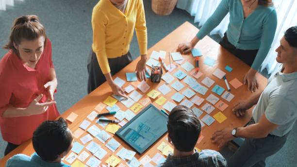 istock Top down view of business people shaking hands and making a contract. Symposium. 2176338555