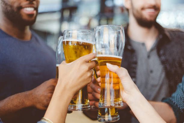 istock Friends toasting with beer in a pub 2176340234