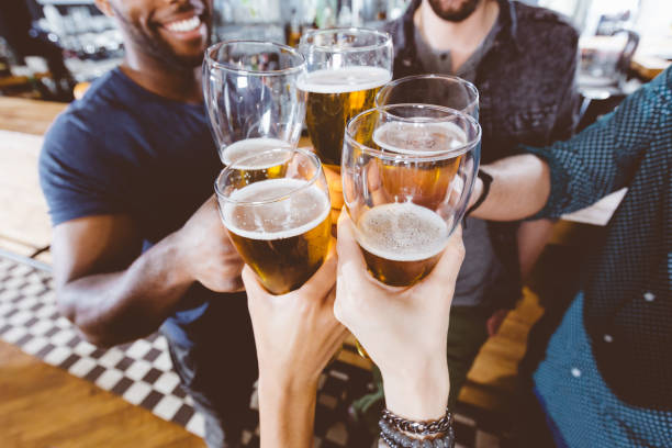 istock Friends toasting with beer in a pub 2176340273