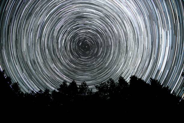 istock Star trails in the night sky 2176351097