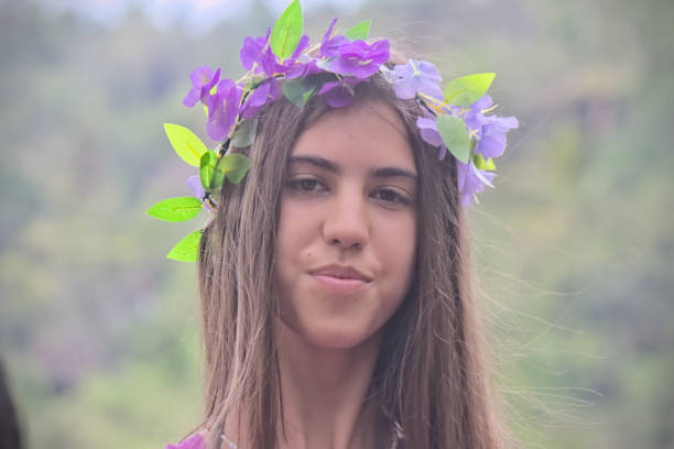 Girl portrait, hair flower decoration, close up view, Bali, Indonesia