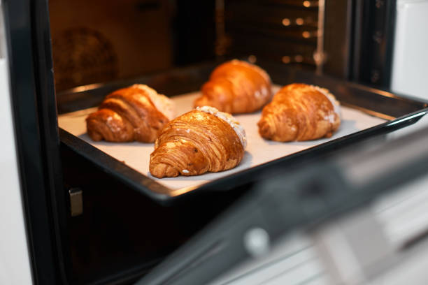 istock Homemade fresh croissant cooked in the oven 2176354508