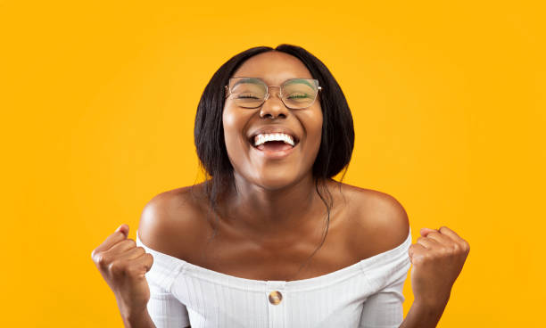 istock Excited African American Lady Gesturing Yes Standing Over Orange Background 2176355589
