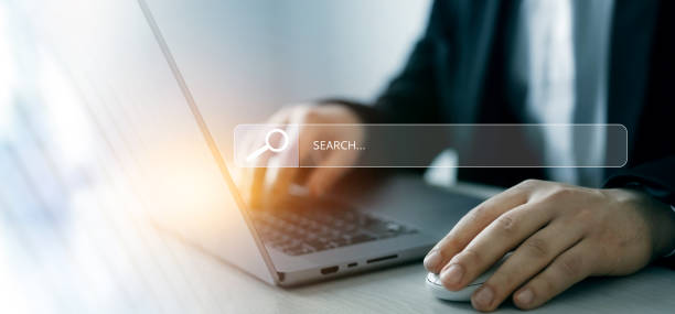 Person clicking internet search page on touch screen. Searching information on internet. SEO searching.