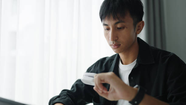 istock Man checking health with a pulse oximeter. 2176360090