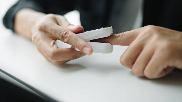 istock Man checking health with a pulse oximeter. 2176360175