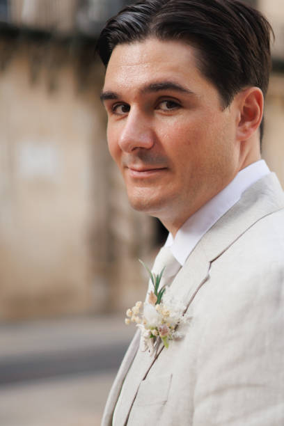 istock Groom looking confidently at camera before entering wedding ceremony 2176362131
