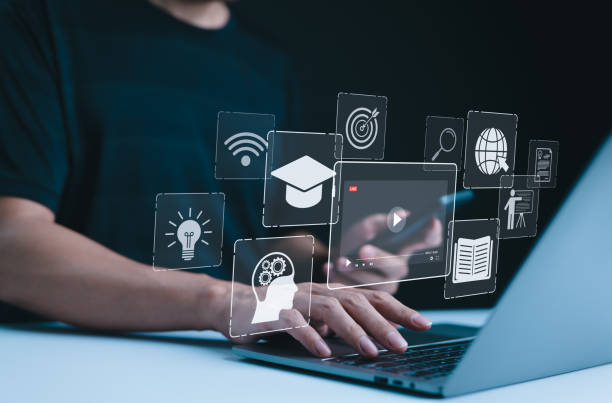 istock Online Education and E-Learning Concept. Person use laptop with icons representing online education, learning, knowledge sharing, educational tools, training, webinar on internet, digital courses, 2176363070