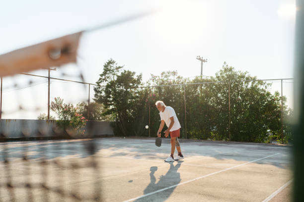 istock A senior man is playing Pickleball 2176364669