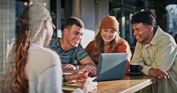 istock Education, laptop and student group of friends on campus together for future or learning. College, smile or university with happy men and women outdoor for development, growth or online study 2176368325