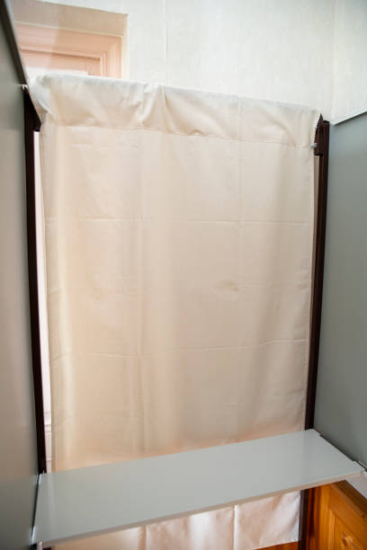 istock Interior of a voting booth with curtains placed in the voting rooms 2176369209