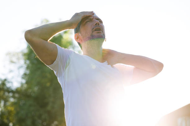 istock Young man having hot flash and sweating in a warm summer day 2176371164