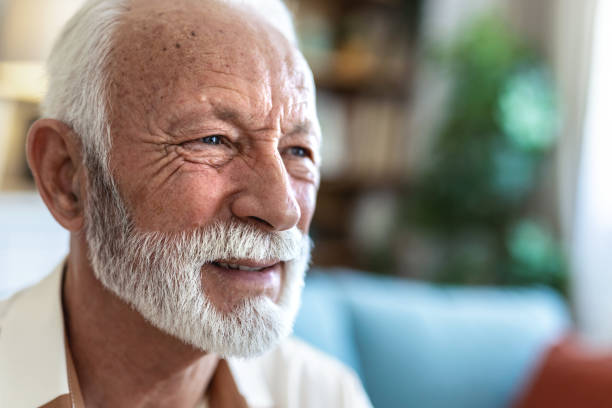 istock Thinking, memory and old man with nostalgia, lounge and nursing home on sofa to relax in lonely retirement. 2176373350