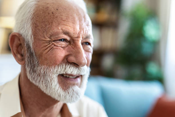 istock Dementia, eyes or nostalgia with senior man in retirement home for idea, memory or thinking. Anxiety, eyesight and mental health with elderly person in living room of apartment for planning or vision. 2176373380