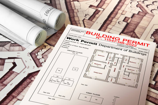 istock BUILDING PERMIT CONCEPT IN BUILDINGS ACTIVITY AND CONSTRUCTION INDUSTRY with residential building project, imaginary cadastral map and General Urban Plan 2176373381