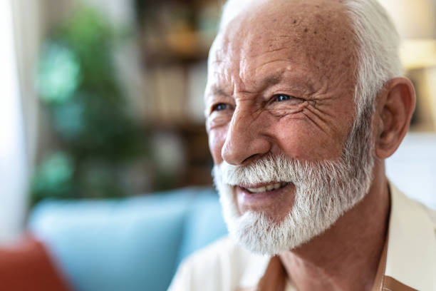 istock Thinking, memory and old man with nostalgia, lounge and nursing home on sofa to relax in lonely retirement. 2176373395