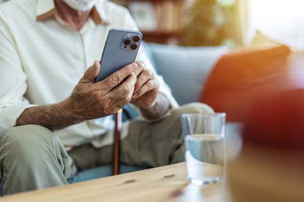 istock Laugh, cellphone and senior man texting for communication, digital conversation and online chat. Technology, notification and mobile app for male person, smile and social media for comedy streaming. 2176373500