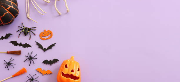 istock Top view image of Halloween. pumpkin over purple background 2176373574