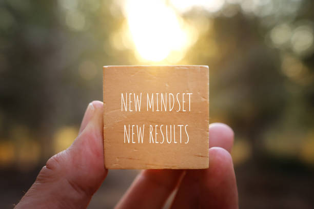 istock image of wooden cube with the text new mindset and results. success and personal development concept 2176373618