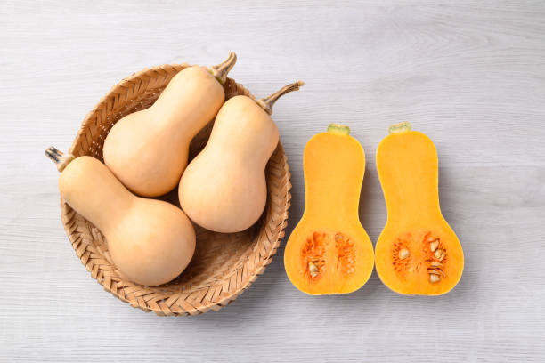 istock Butternut squash pumpkin in basket on white table 2176380861