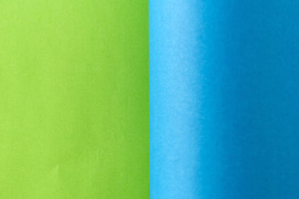 Colored paper texture. Two blank colored sheets of paper. Abstract background for creativity