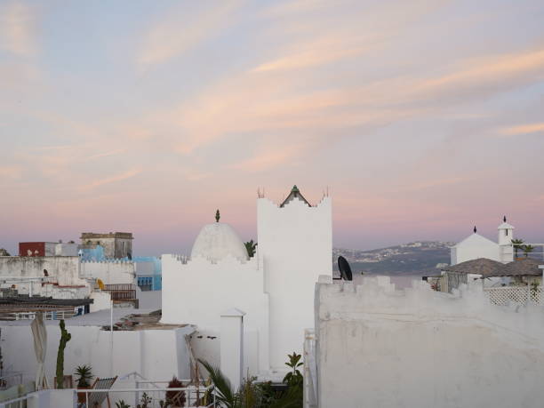 istock beautiful sunset view on top of white buildings 2176391967