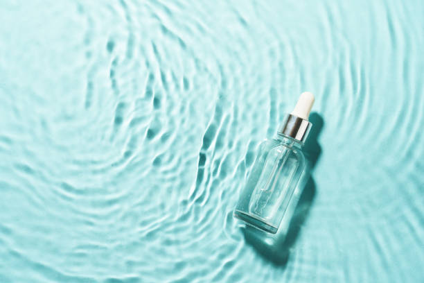 istock Serum bottle in the water with waves. 2176392123