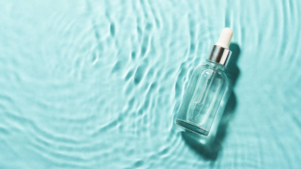 istock Serum bottle in the water with waves. 2176392125